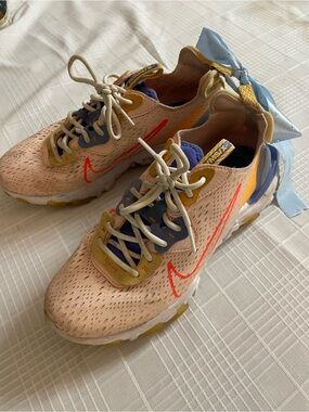 Nike Women’s Peach, Blue & Yellow Lightweight Sneakers